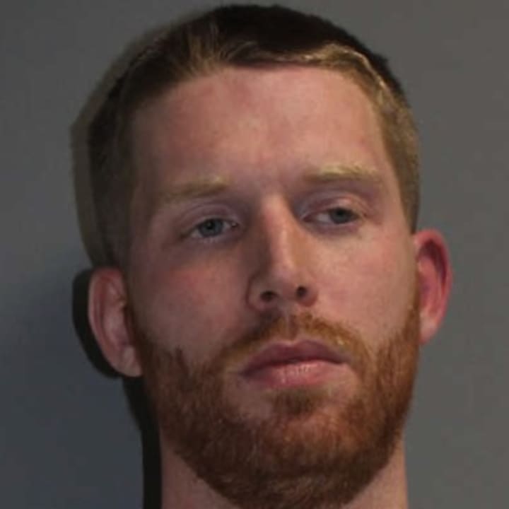 Edward King, 28, of Ridgefield was charged in Norwalk with driving under the influence and carrying a weapon in his car.