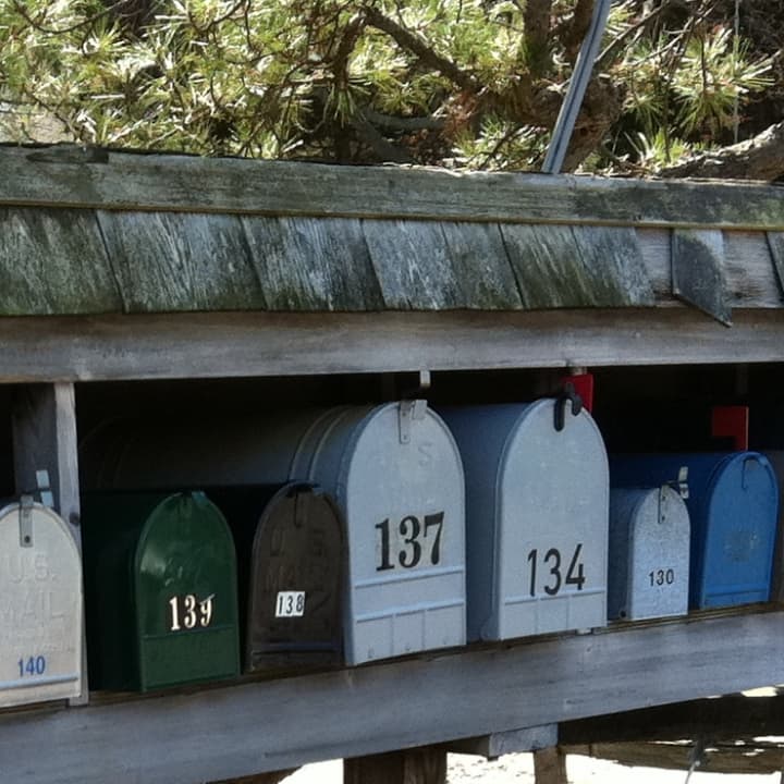 First-class mail delivery on Saturdays will end in August, but packages and Express Mail still will be delivered.