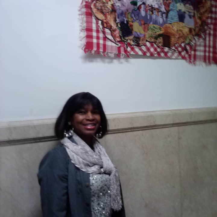 Artist and Mount Vernon resident Fanny Miller-Beard shows her piece &quot;Sunday Heritage&quot; at City Hall.