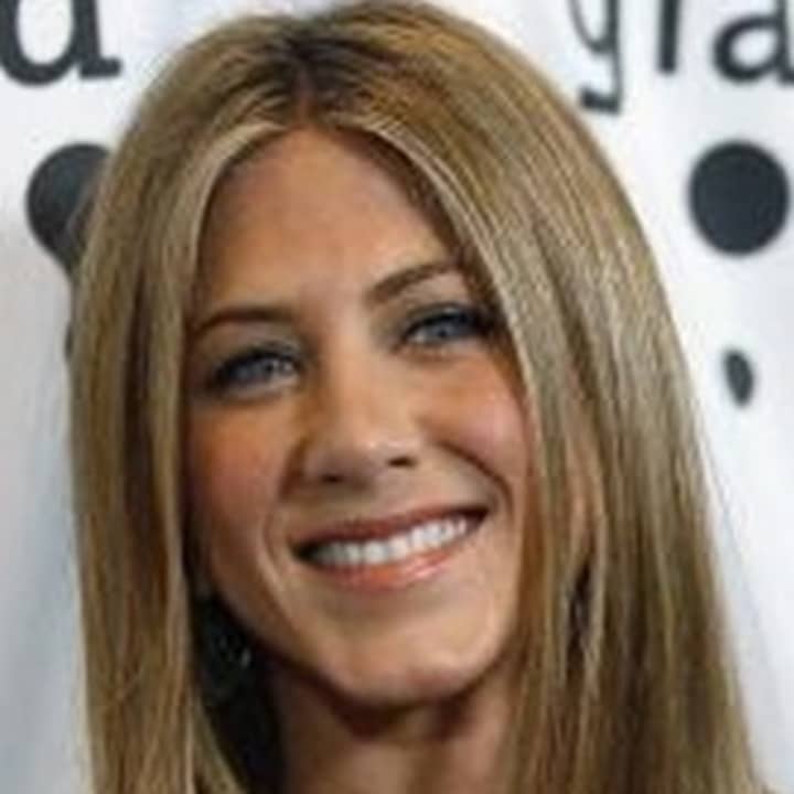 Greenwich residents are being paid to stay away from a movie shoot in town starring Jennifer Aniston.