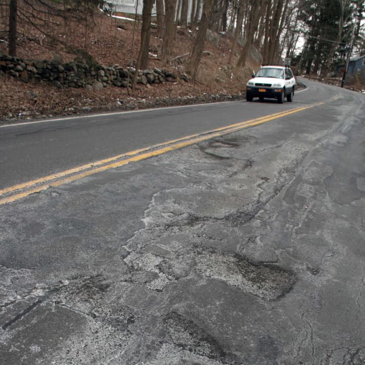 Lewisboro residents complain about potholes on Route 123.