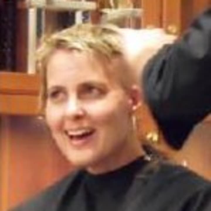 Katherine Price Sloan Snedaker had her hair cut off earlier this month. She is fighting breast cancer.