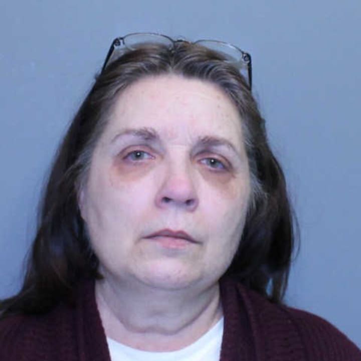 Katherine Norwood, 58, of Norwalk was arrested on breach of peace and interfering with an officer charges Thursday.
