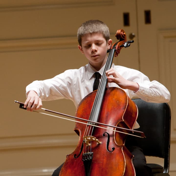 Four young musicians, including 13-year-old cellist Callum Nissen, pictured, will perform at the Greenwich Arts Center on May 5.