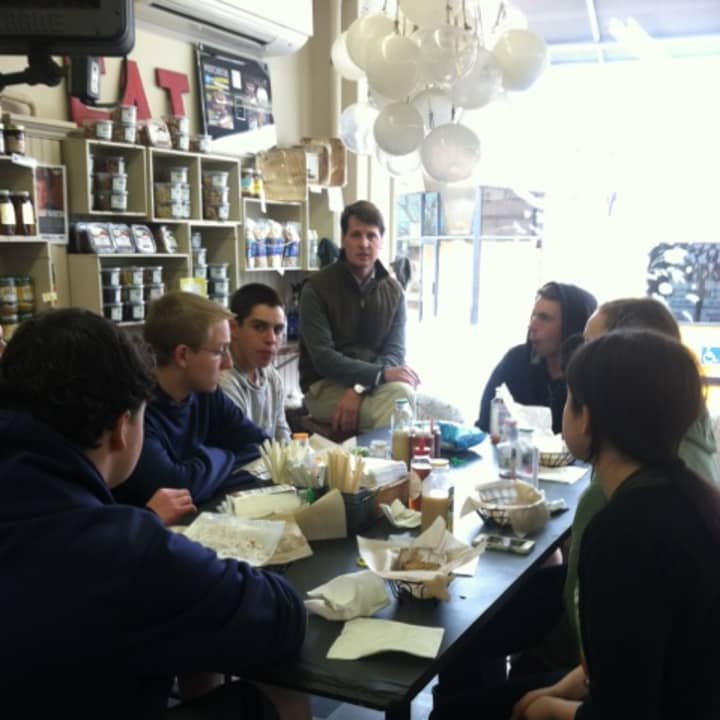 Byram Hills students discuss the farm-to-table movement with Table co-owner Peter Menzies. 