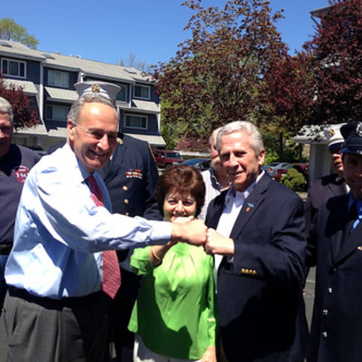 Rye Brook veteran Jim Smith with U.S. Sen. Charles Schumer after receiving his Purple Heart award 43 years after being injured in the Vietnam War.