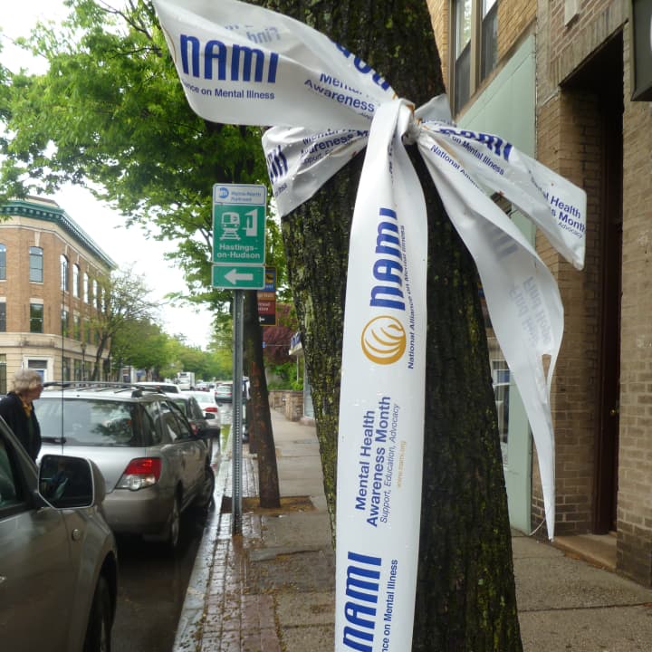 Trees and utility poles in the Rivertowns and Greenburgh are decked wth ribbons in support of mental illness awareness.