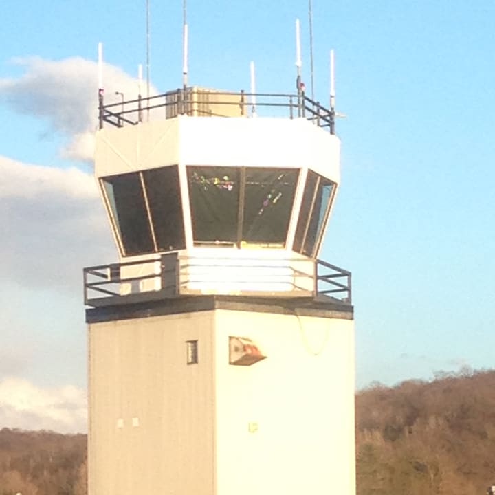 The tower at Danbury Airport will stay open after the FAA announced a delay Friday in its decision to close 149 such towers across the nation.