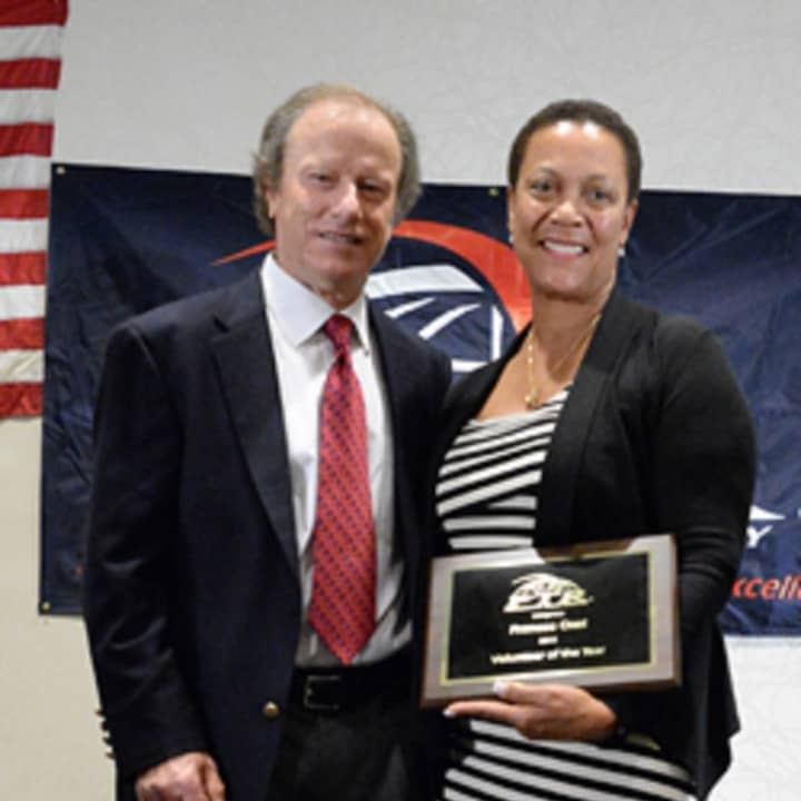 Fran Osei is shown in 2015 with Roy Barth, president, Professional Tennis Registry when she was named the registry&#x27;s Volunteer of the Year.