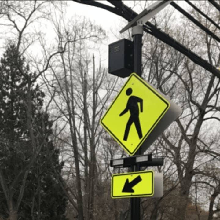 Stamford has installed four of these high-tech pedestrian crossing signals,  known as Rectangular Rapid Flashing Beacon (RRFB). See story for the locations.