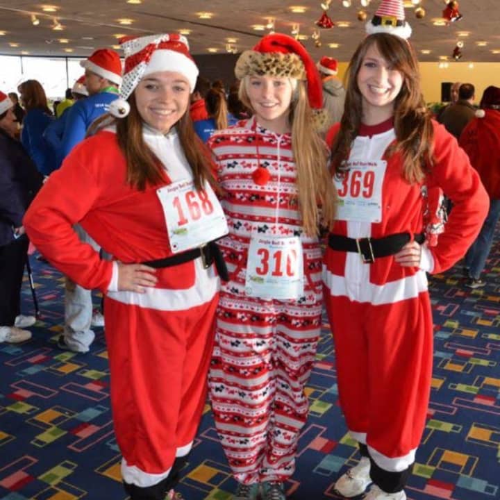 Runners wore Santa Claus-themed outfits at last year&#x27;s Jingle Bell Run in Purchase.