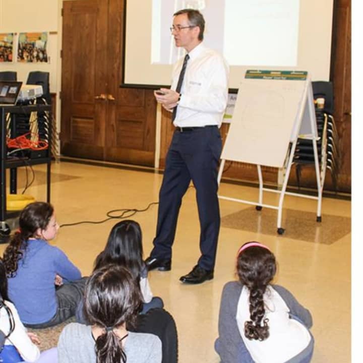 Captain Ian T. Blackley entertained Edgewood fourth-graders with drawings and photos of the inside of historic and modern-day ships during his recent visit.
