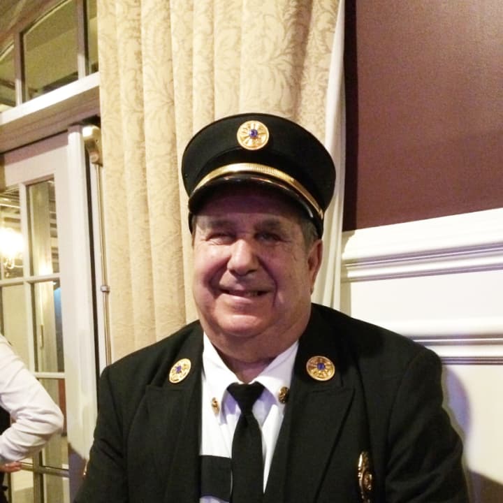 Dave Sweeney Sr., pictured, was among the Croton Falls firefighters honored at the annual inspection dinner.
