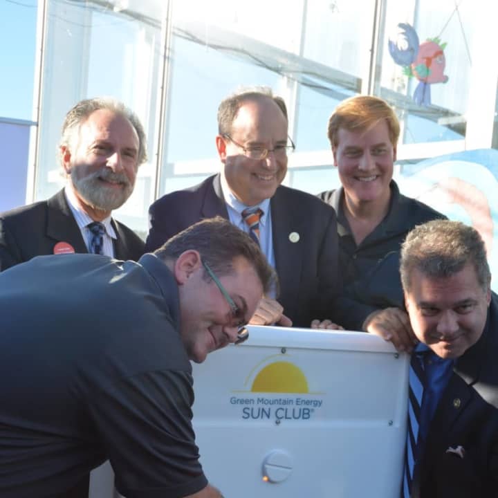 Yonkers Mayor Mike Spano literally flipped the switch to welcome the new solar energy source at the Science Barge.