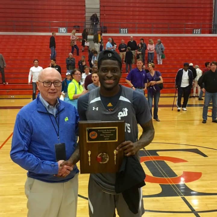 A.J. English accepting his MVP award at the Portsmouth Invitational Tournament Championship.