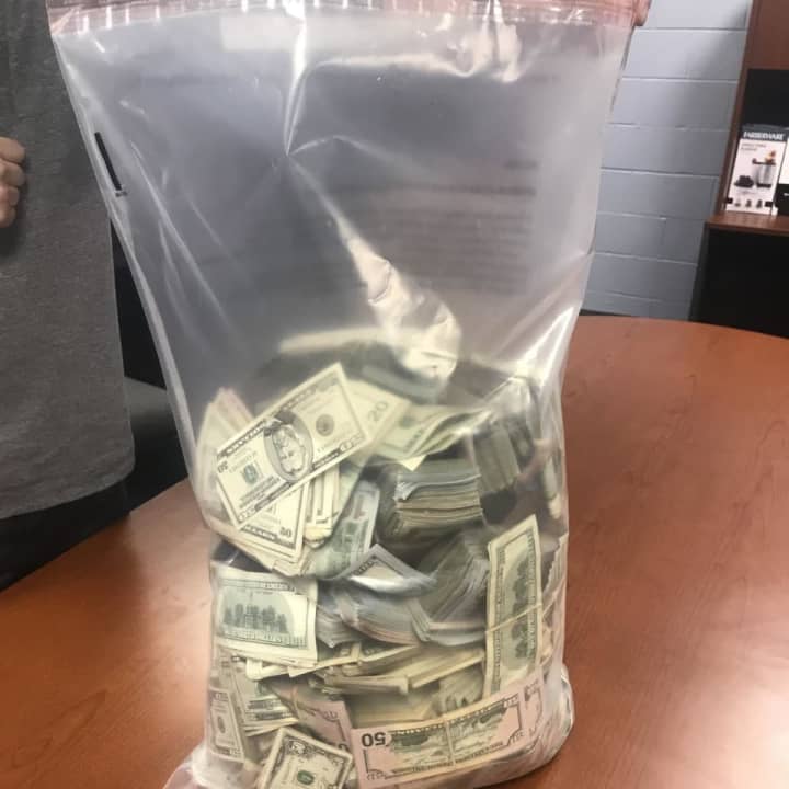 Hundreds of thousands of dollars were seized during a drug bust in Pleasantville.