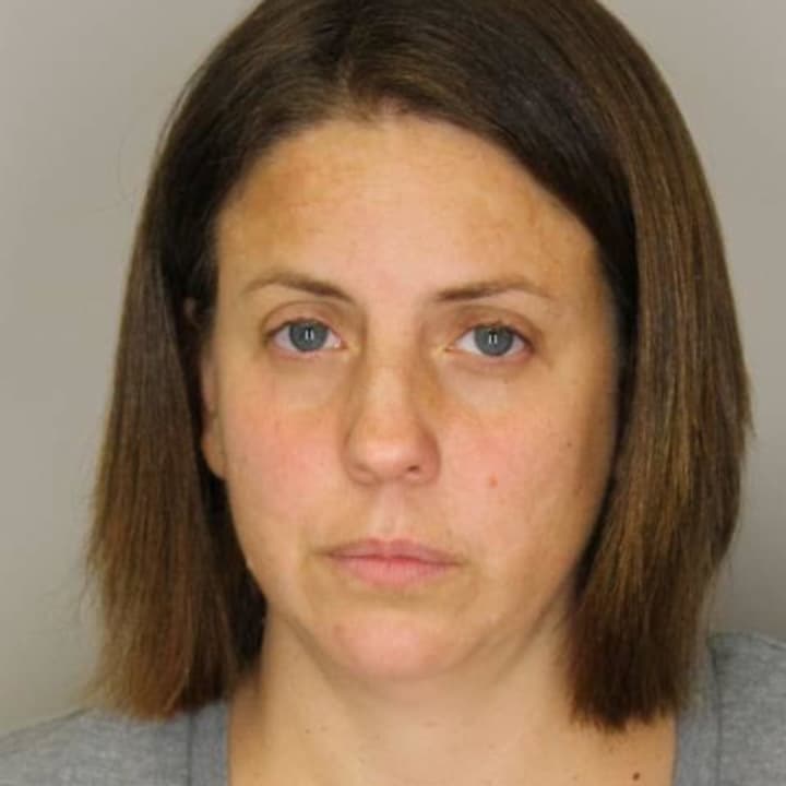 Hyde Park resident Amy McCardle--Rausenberger was sentenced to 2 to 6 years for stealing items from the Hyde Park Central School District.