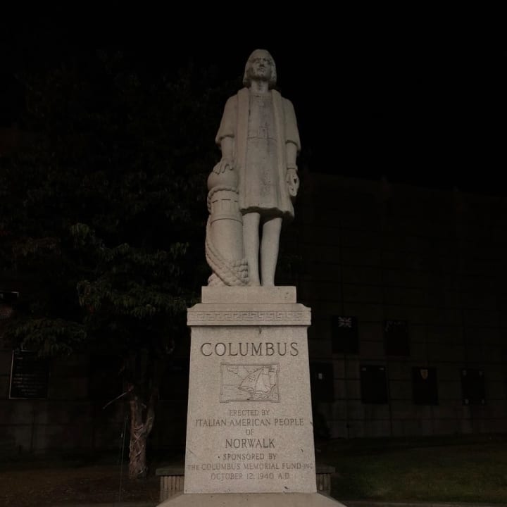 The words &quot;Fake News&quot; was found painted on the pedestal of the statue of Christopher Columbus at the Heritage Wall on West Avenue in Norwalk.