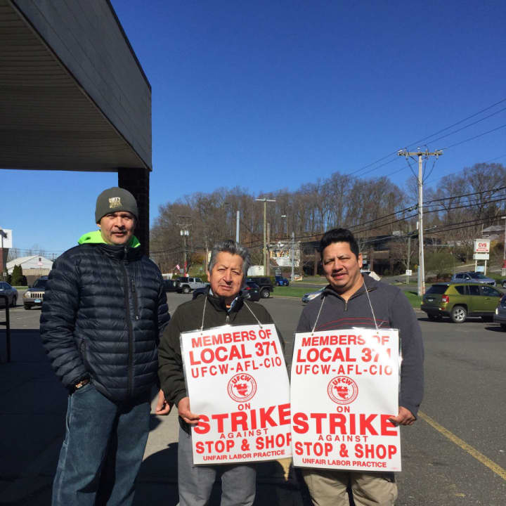 Store employees, Sabino Hernandez, Wilson Segarra, Manuel Pauta hold signs outside Stop &amp; Shop, located at 44 Lake Ave. Ext. in Danbury on Tuesday morning, April 16, day six of the workers&#x27; strike.