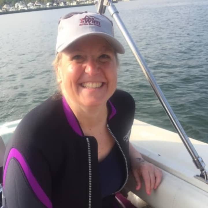 Kim Adler of Shelton, who is battling cancer, is part of a relay team in the 2017 Swim Across the Sound.