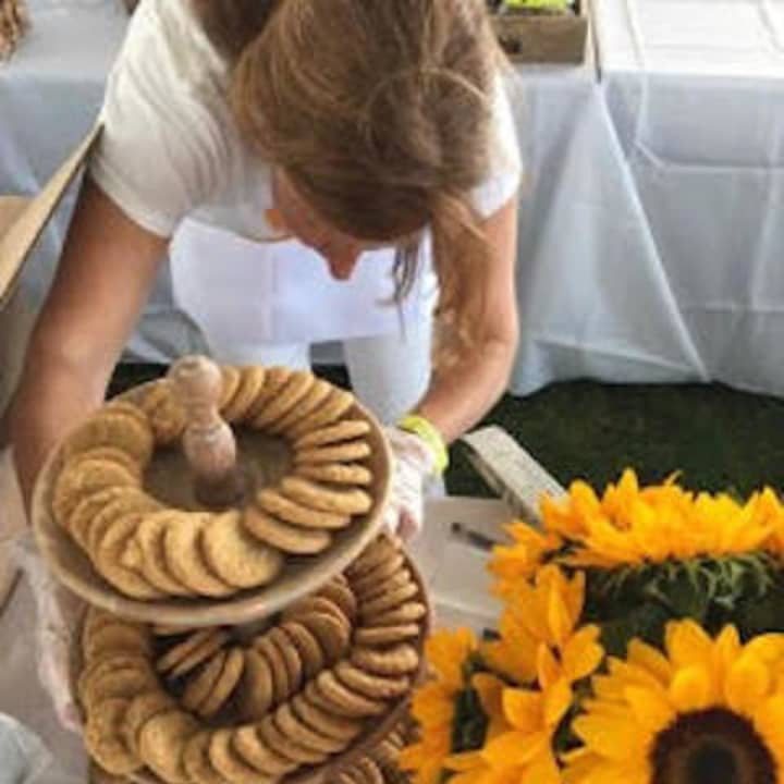 Fairfield resident Sharon Early of Early&#x27;s Edibles shows off her sunflower power at the 2017 Greenwich Wine + Food Festival.