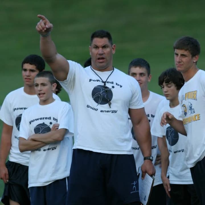 Personal trainer Pete Ohnegian is shown with athletes.