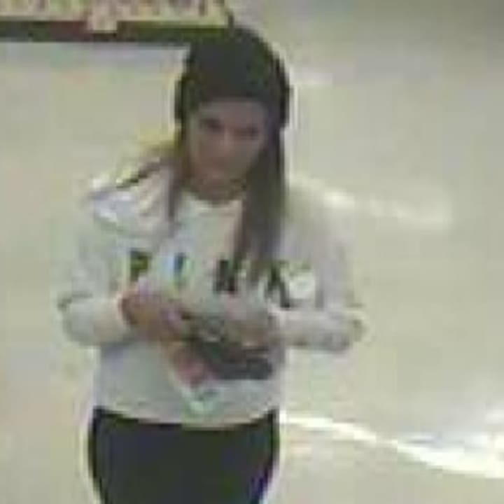 Police in Suffolk County are attempting to locate a woman who used stolen credit cards to spend thousands of dollars.