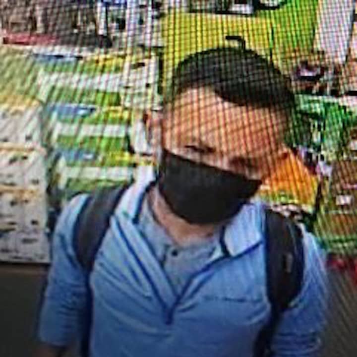 A man is wanted for using a stolen credit card at two Long Island stores.