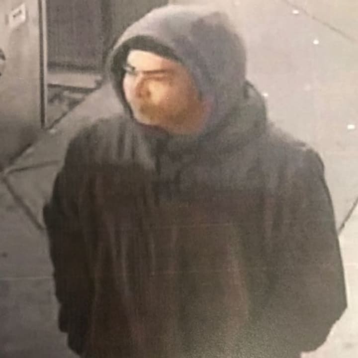 A man is wanted for stealing a pocketbook with credit cards in a Patchogue office building, police said.