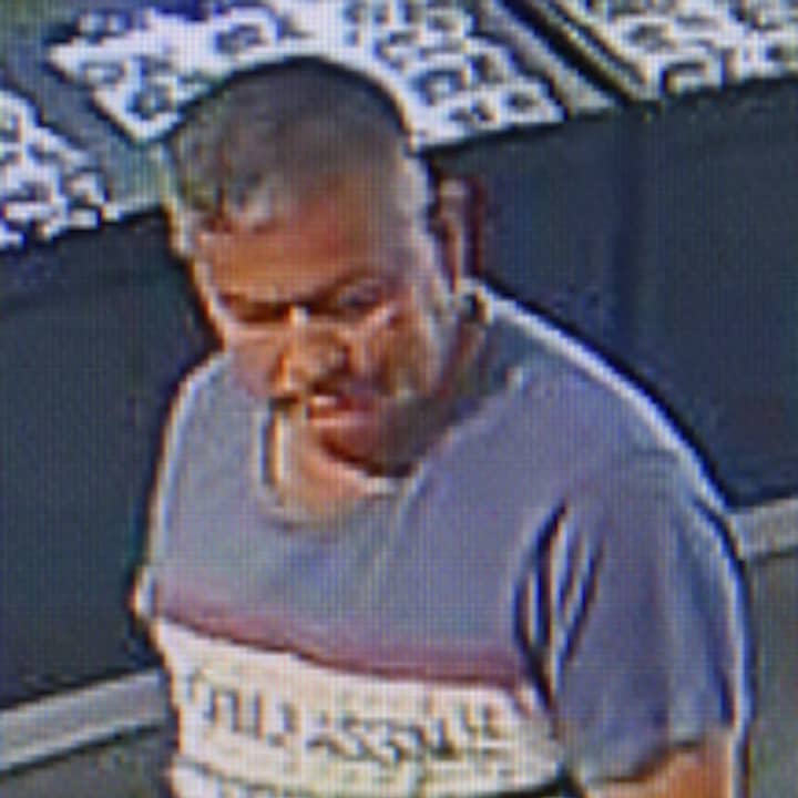 A man is wanted for allegedly using a stolen credit card at the Tanger Outlets on Long Island.