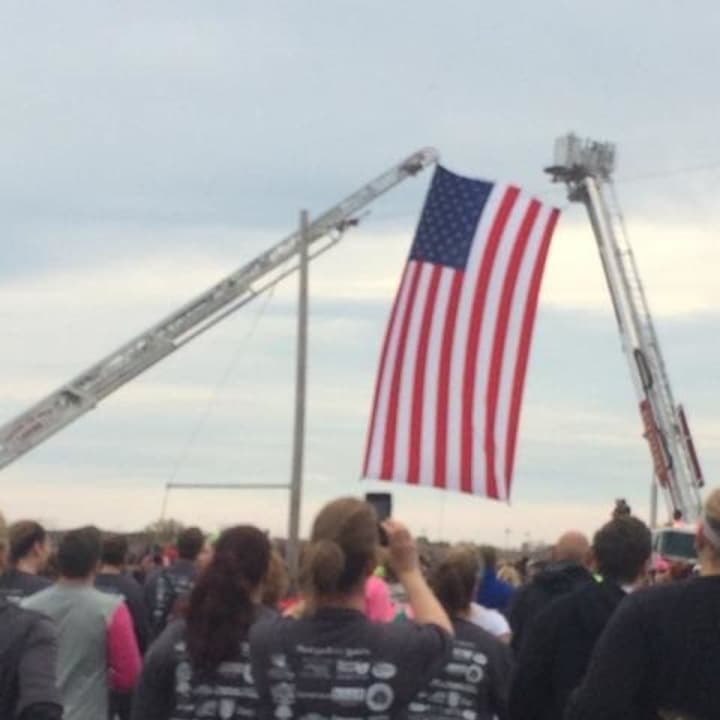 An American flag is displayed at the Vicki Soto 5K Race in Stratford, Conn., in November. The race is run in honor of slain Sandy Hook teacher Victoria Soto, who died protecting her first-grade students from crazed gunman Adam Lanza in 2012.