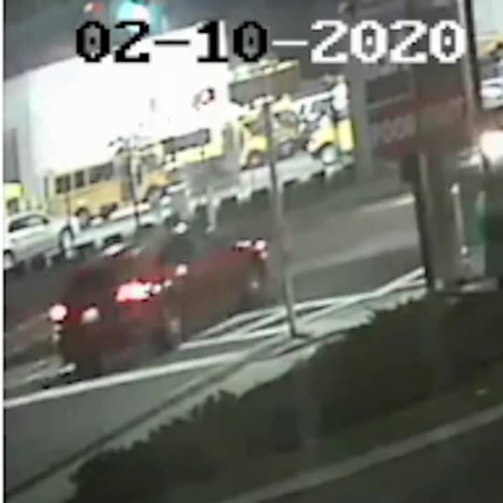 A photo of the red SUV (shown above) released by police prior to the arrest.