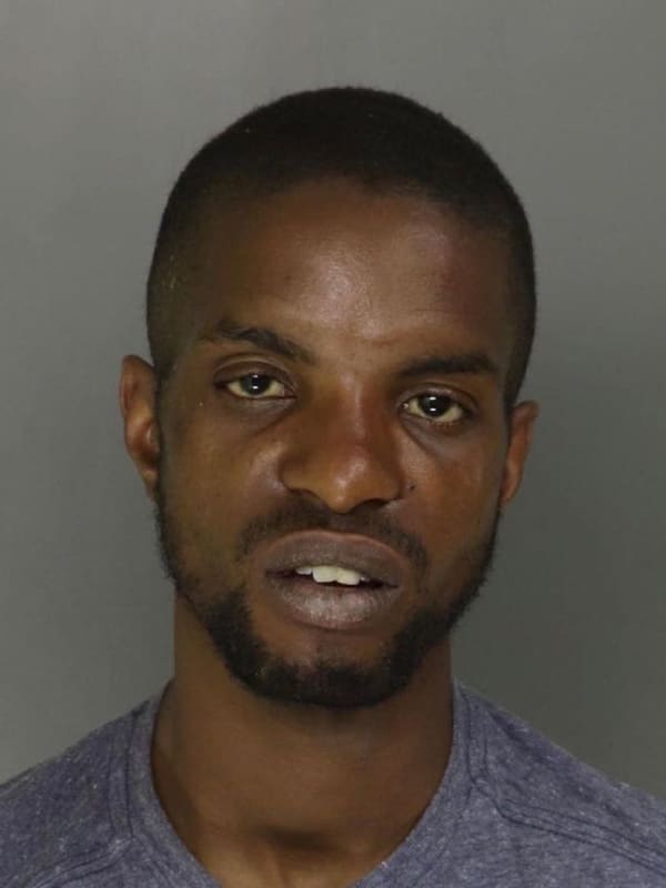 Newark PD: Carjacker Caught Hiding In Backyard After Crashing Pickup Stolen At Knifepoint