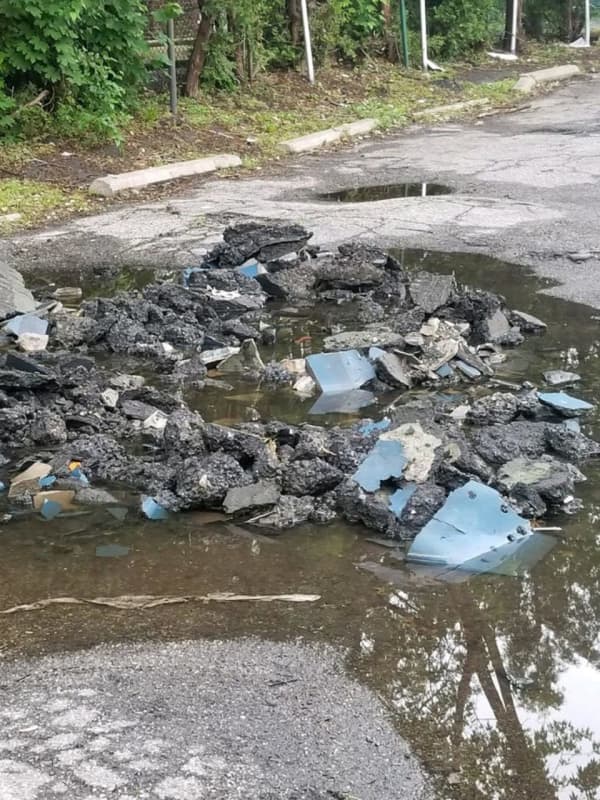Truck Driver From CT Cited For Illegally Dumping Asphalt In NY Parking Lot