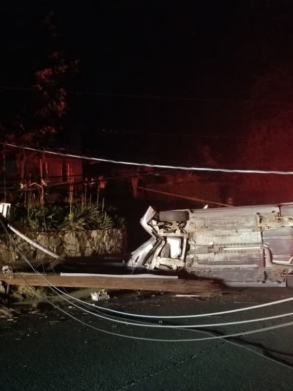 Driver Hospitalized After Car Slams Into Pole In Fairfield County