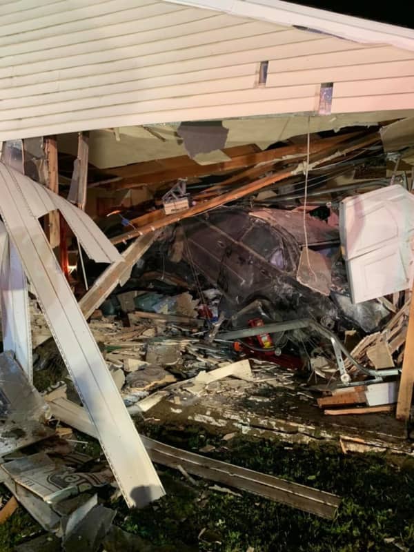 PHOTOS: Car Slams Into Northampton County Home, Causes Partial Collapse