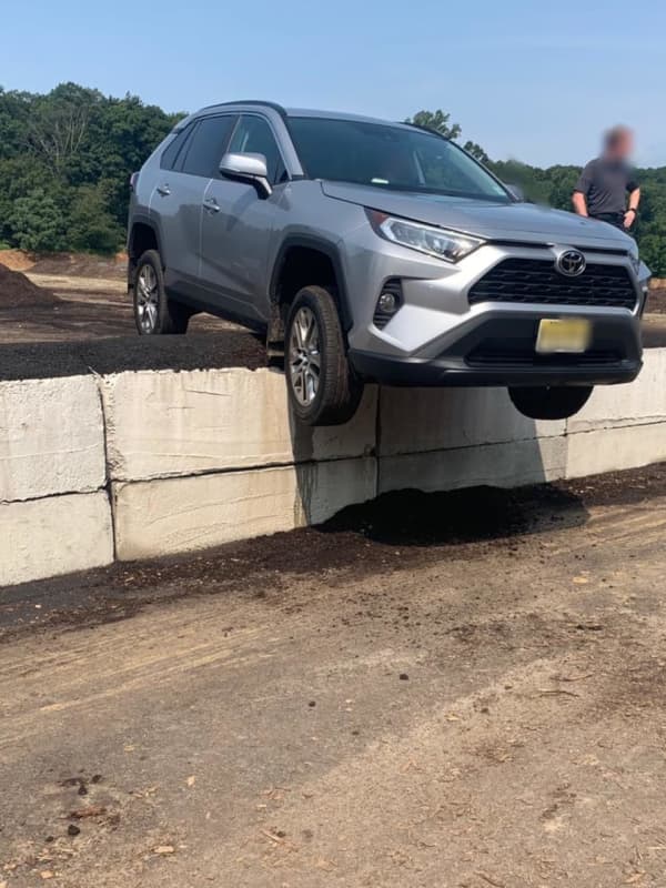 Driver Rescued From Vehicle Teetering Over Edge Of Barrier Wall In Morris County [PHOTOS]