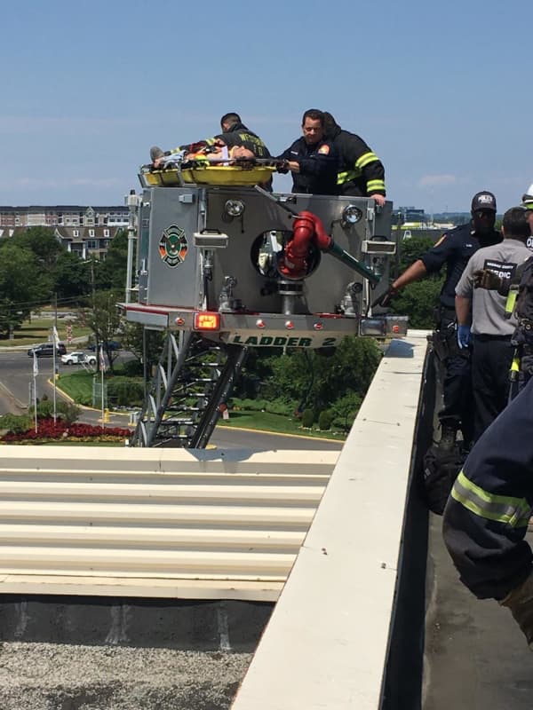 Nassau County Worker Rescued After Falling Through Roof