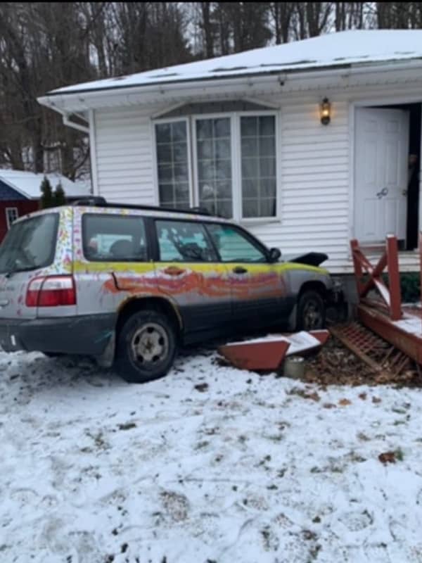 Airborne Car Crashes Into Home In Region, Police Say