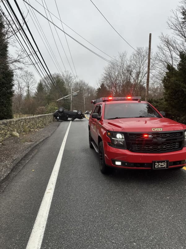 Vehicle Rollover Snaps Pole, Shuts Down Busy Road In Westchester