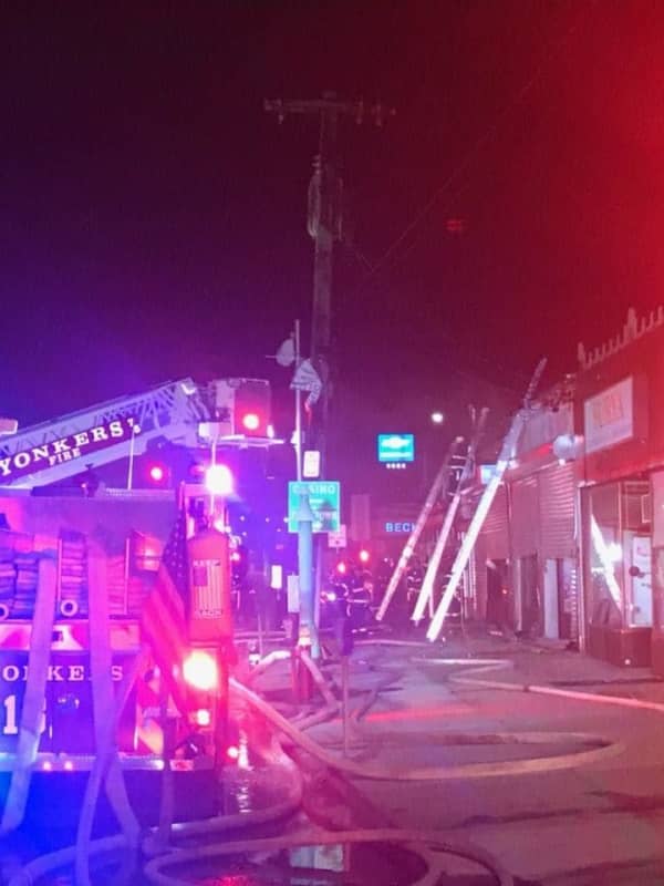 Firefighter Injured In Two-Alarm Blaze That Damages Row Of Stores In Westchester