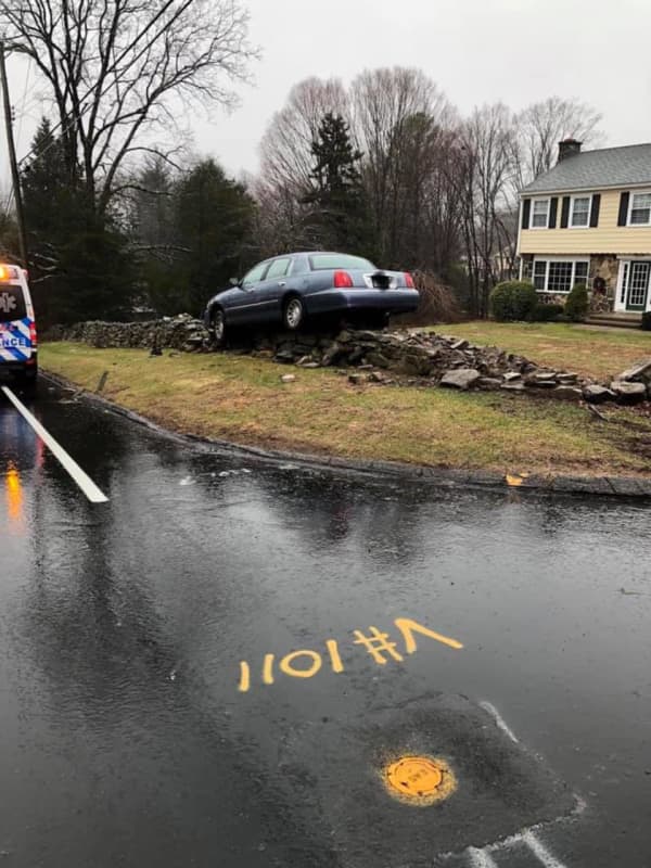 Car Lands On Top Of Stone Wall In Trumbull Crash