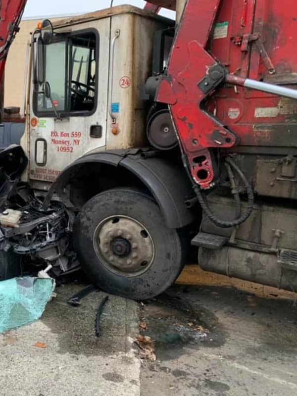 Garbage Truck Driver Ticketed After Route 59 Crash Leaves One Critical