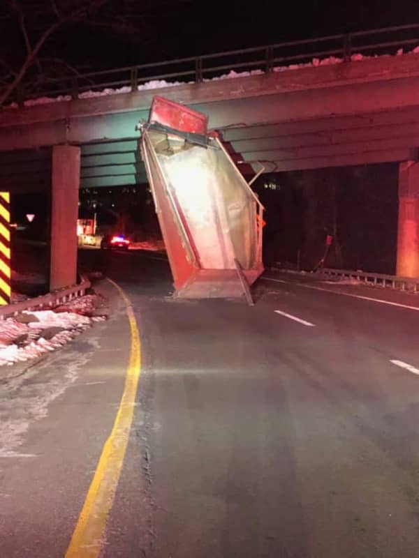 Dump Truck Slams Into Westchester Avenue Overpass