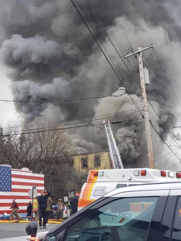Four-Alarm Fire Breaks Out In Three-Story Building, Causing Road Closures In Area