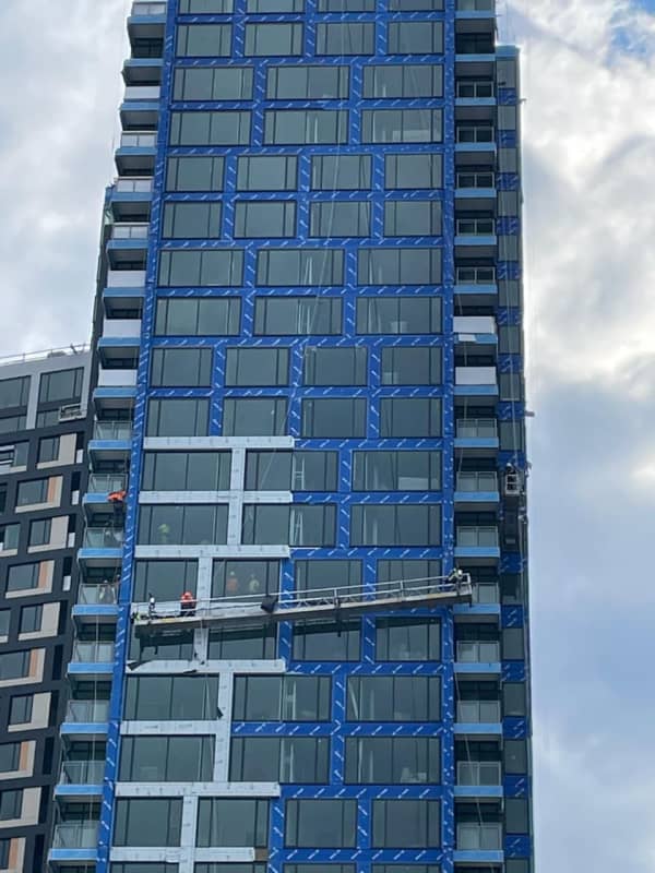 Workers Rescued From Scaffold Several Stories Up High-Rise Building In Fairfax County