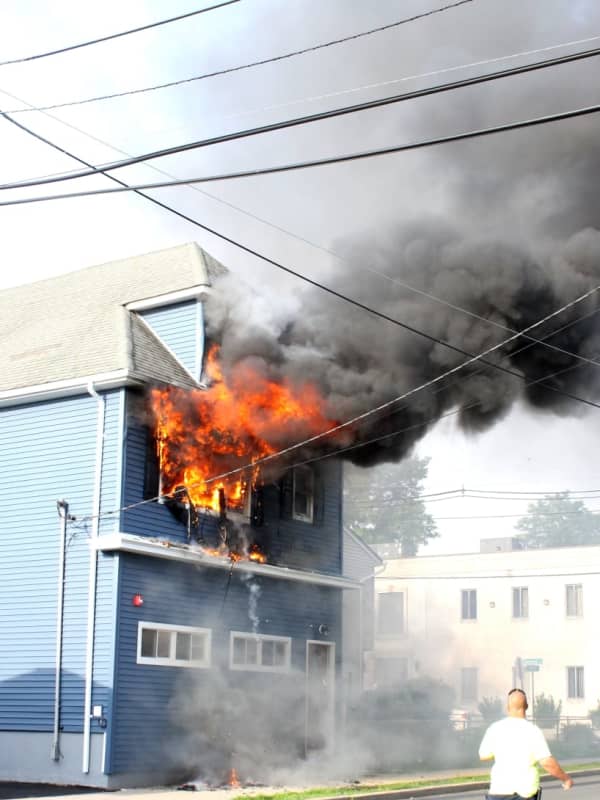 PHOTOS: Firefighters Douse Roaring House Blaze
