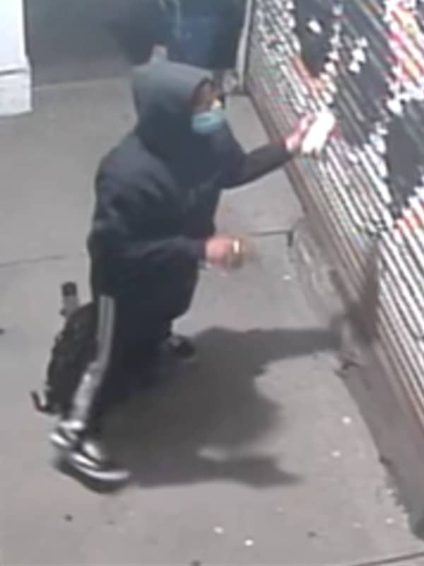 Police Searching For Duo Who Spray Painted Long Island Liquor Store