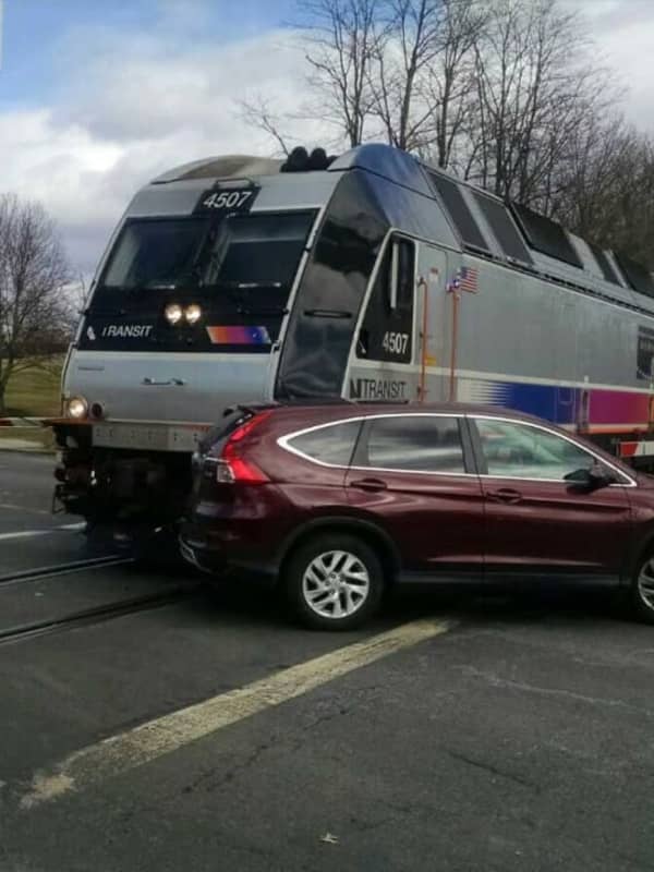 Train Strikes Car On Tracks In Rockland