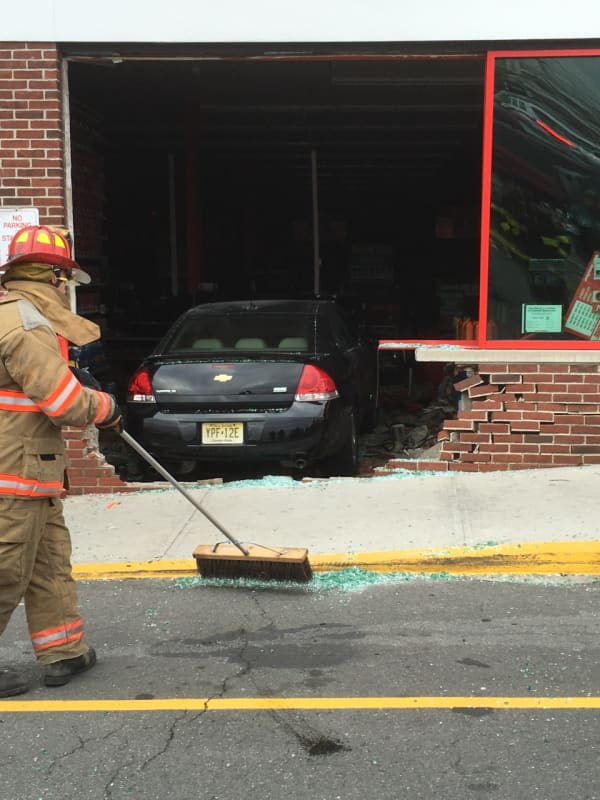 Elderly Driver's Sedan Barrels Into Two Cars, AutoZone Store In Fairview